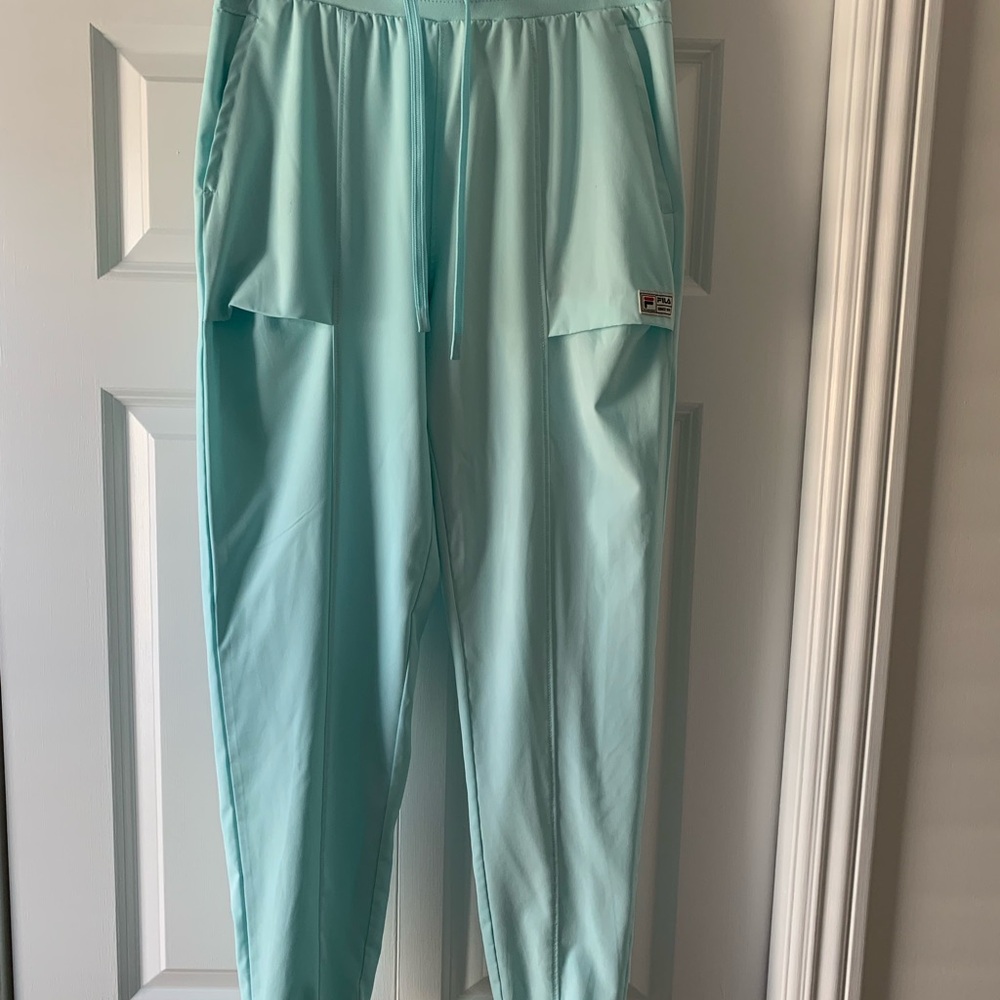 Fila Women’s  Aqua Blue  track Jogger Pants. Size US S